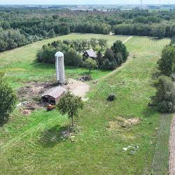 Three bedroom Chalet home on 40 acres and pole Barn and 2 Artesian wells