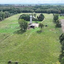 Three bedroom Chalet home on 40 acres and pole Barn and 2 Artesian wells
