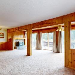 Three bedroom Chalet home on 40 acres and pole Barn and 2 Artesian wells