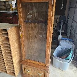 Tall Oak Display Cabinet With Glass Door and Deer Motif Storage