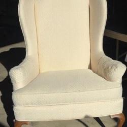 Vtg cream-colored wingback armchair