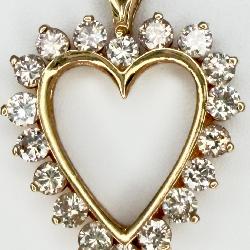 14K Gold Heart Shaped Pendant w/ 18 Nice Diamonds