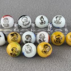 13 Comic Glass Marbles, Appr. 1/2” D