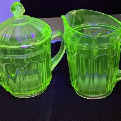 vintage Anchor Hocking green uranium glass creamer and lidded sugar bowl set in the Colonial (also known as 