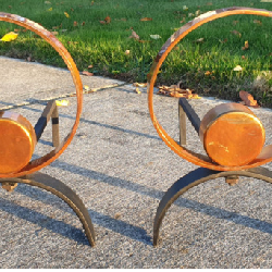 Pair of Solid Metal Brass MCM, Donald Deskey??? Scroll Andirons.